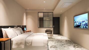Deluxe Double Room | 1 bedroom, down comforters, free minibar, desk