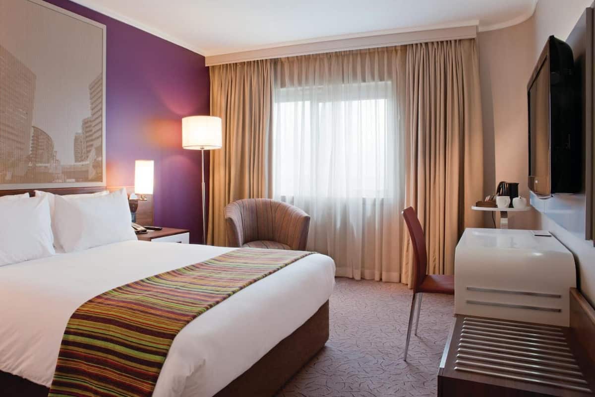 Hypo-allergenic bedding, down duvets, in-room safe