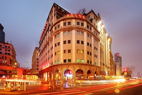 Front of property – evening/night. Xinhua Hotel