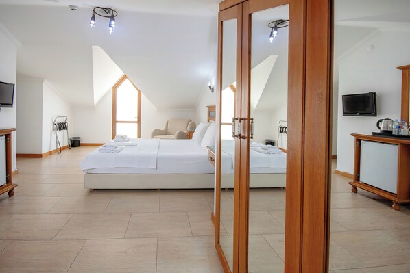 Ropa de cama de alta calidad y minibar