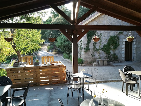 Breakfast, lunch, dinner served; Spanish cuisine, garden views