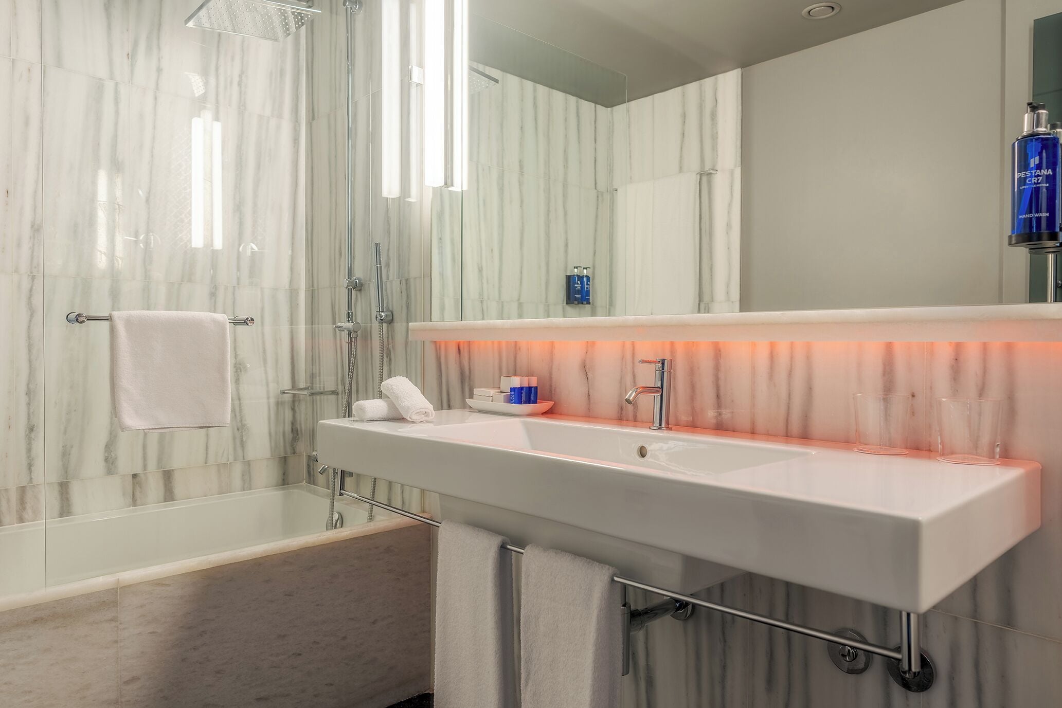 deep-soaking bathtub, free toiletries, hair dryer, bathrobes