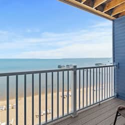 Desk, laptop workspace, blackout drapes, iron/ironing board