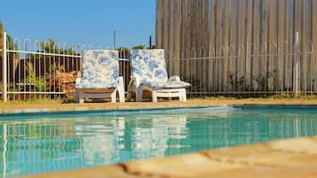 Outdoor pool, sun loungers