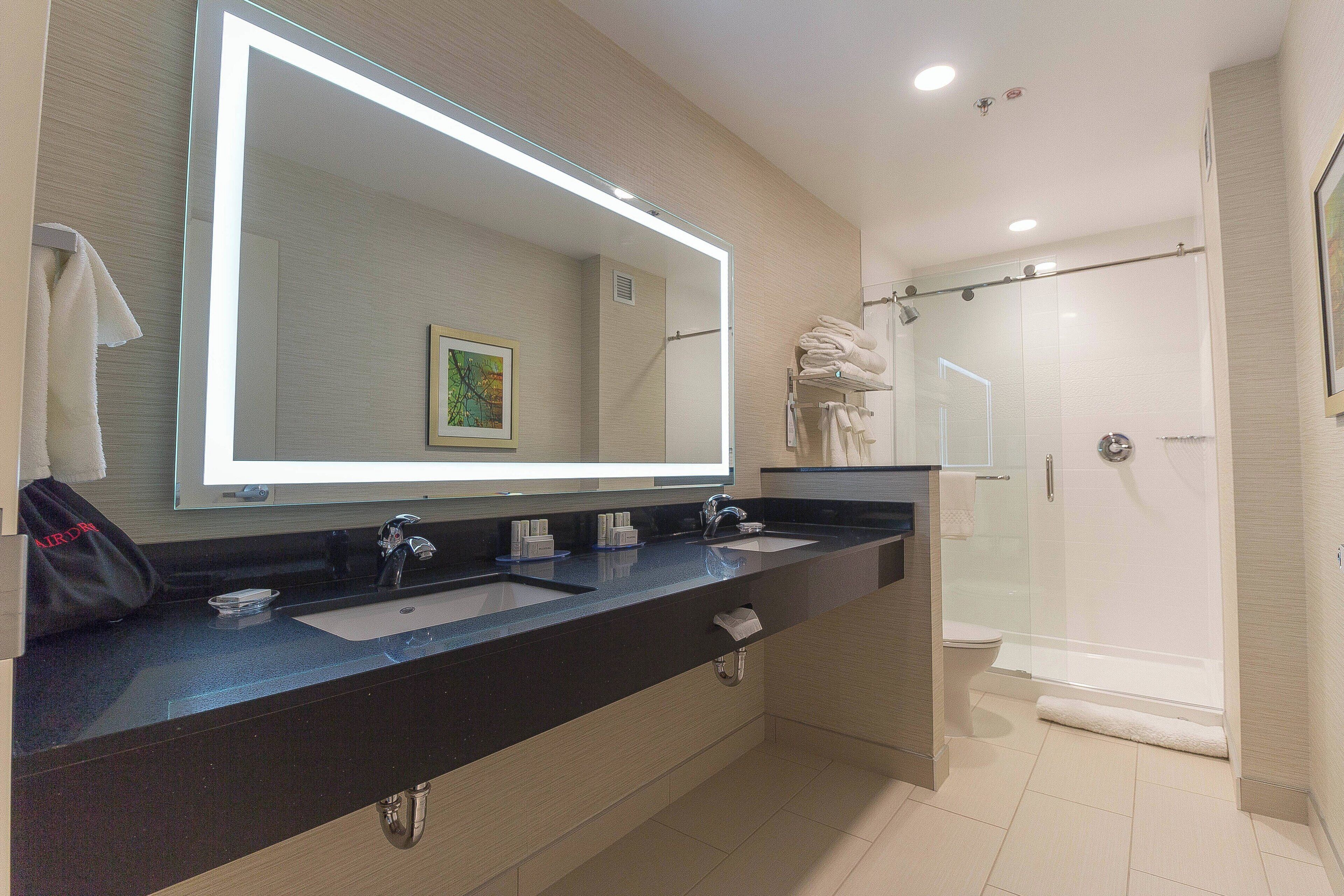 suite, multiple beds, non smoking | bathroom | free toiletries, hair dryer, towels