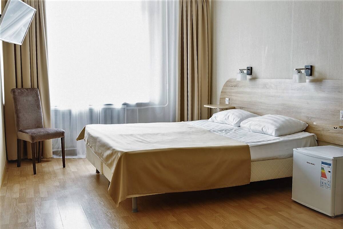 Economy Single Room, Shared Bathroom | In-room safe, desk, iron/ironing board, free rollaway beds