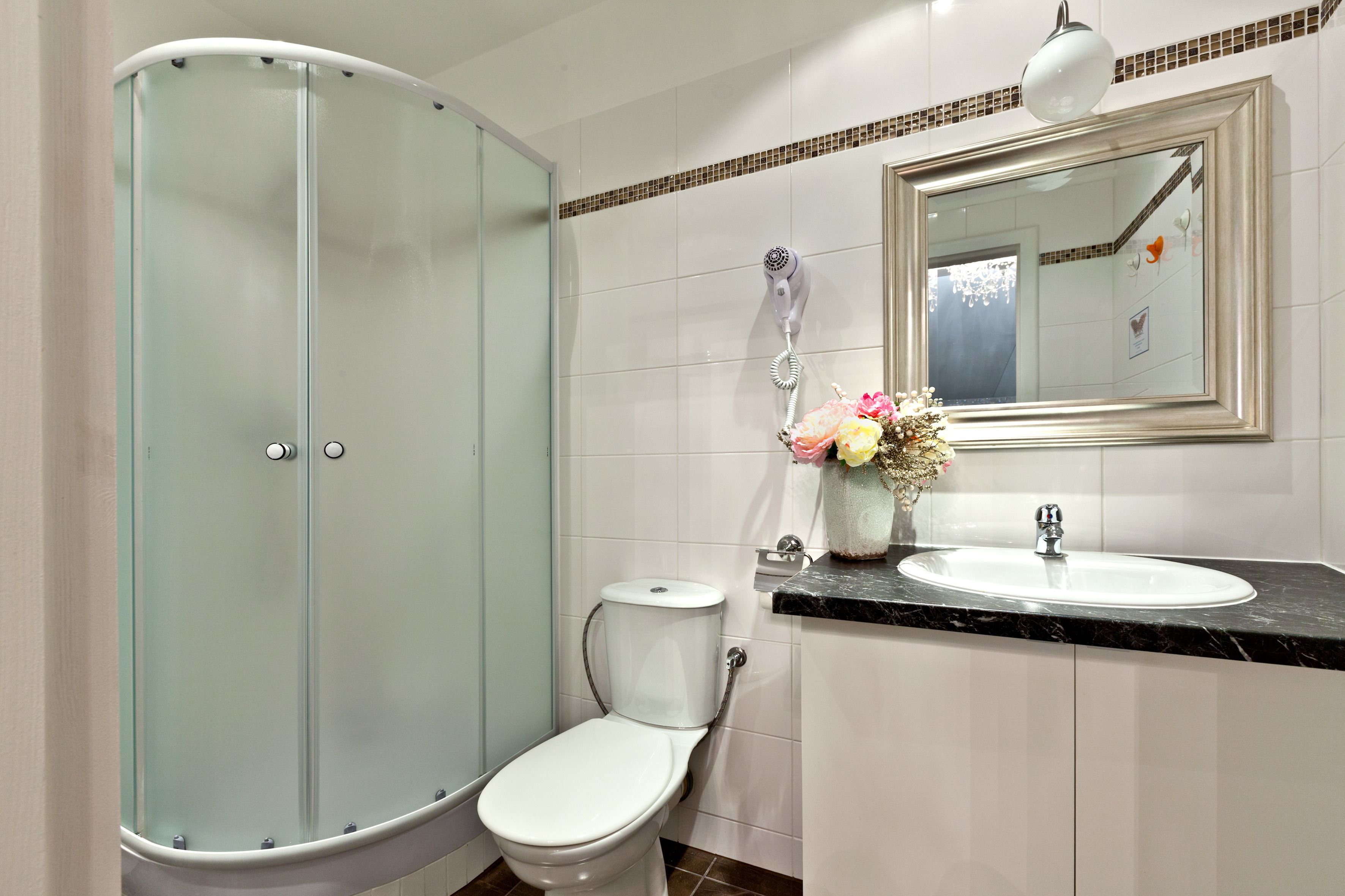 deluxe studio (family, 4 adults) | bathroom | free toiletries, hair dryer, towels, soap