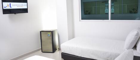 Minibar, coffres-forts dans les chambres, bureau, lits bébé (gratuits)