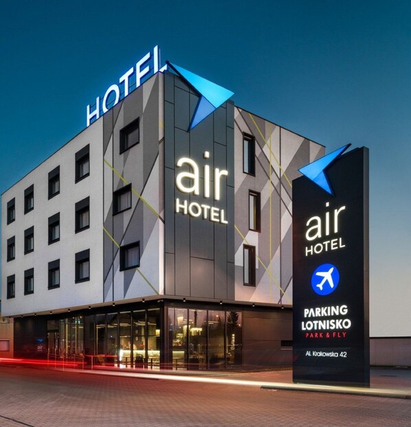 A modern hotel building with a prominent 'air hotel' sign, featuring a geometric facade and large windows. - Air Hotel (Warsaw)