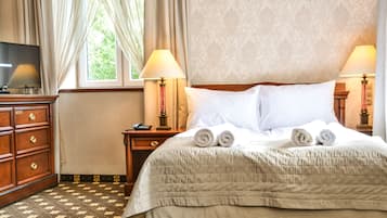Habitación individual | Ropa de cama de alta calidad y minibar