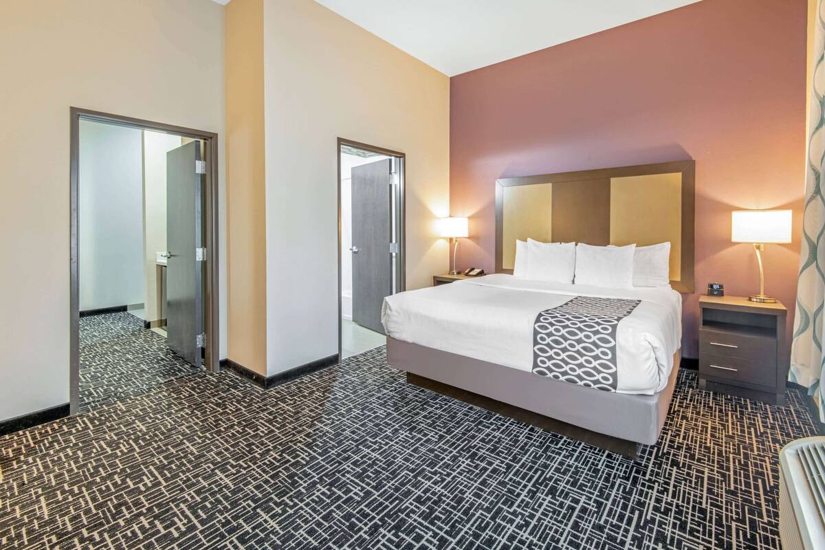 suite, 1 king bed, non smoking | premium bedding, desk, iron/ironing board, free cots/infant beds