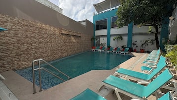 Outdoor pool, pool umbrellas, pool loungers