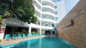 Outdoor pool, pool umbrellas, sun loungers