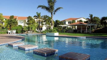 Outdoor pool, pool umbrellas, sun loungers