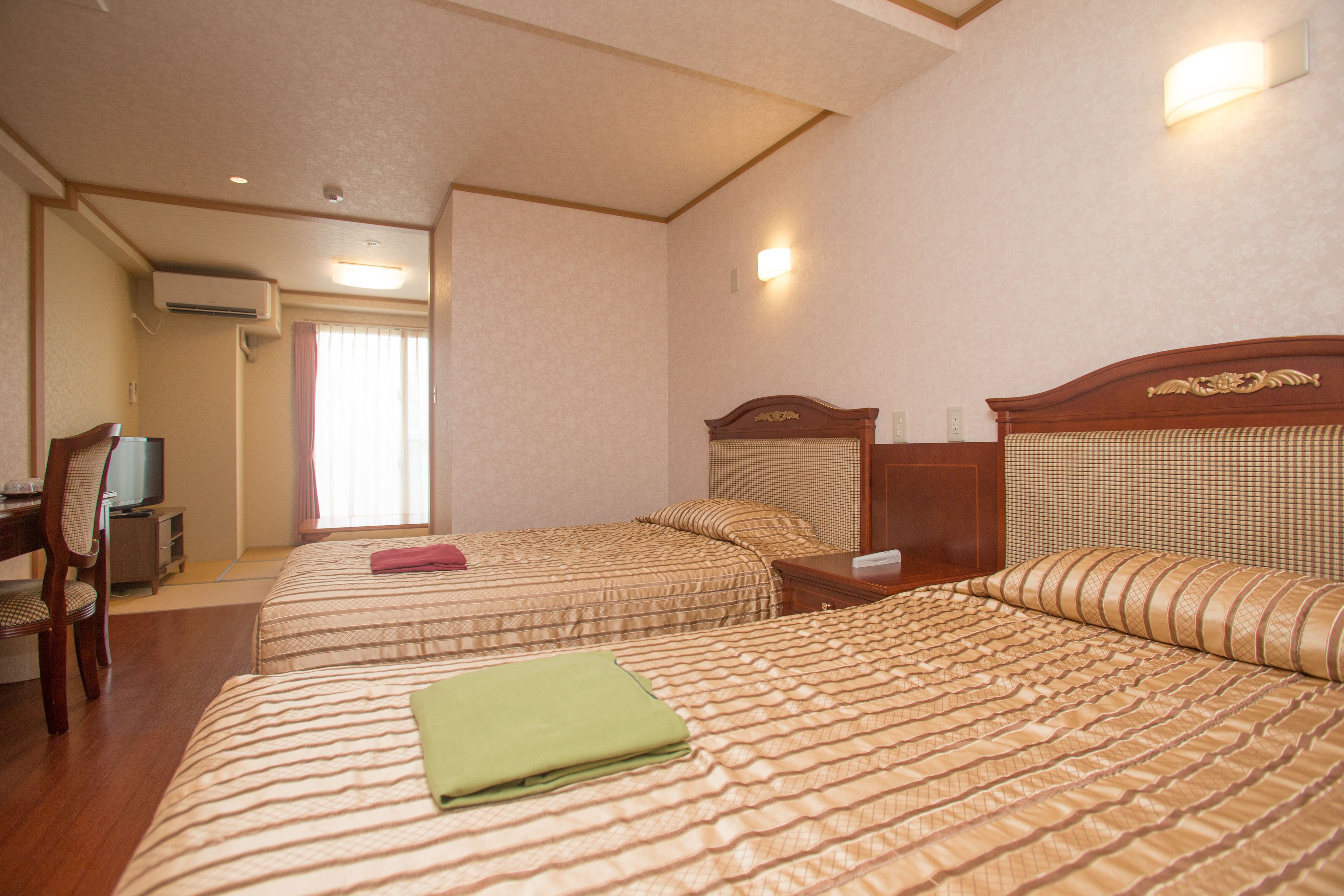 japanese & western room, garden view | in-room safe, desk, free wifi, bed sheets