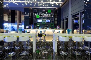 8 bars/lounges, poolside bar, beach bar