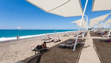 Private beach, free beach shuttle, sun-loungers, beach umbrellas