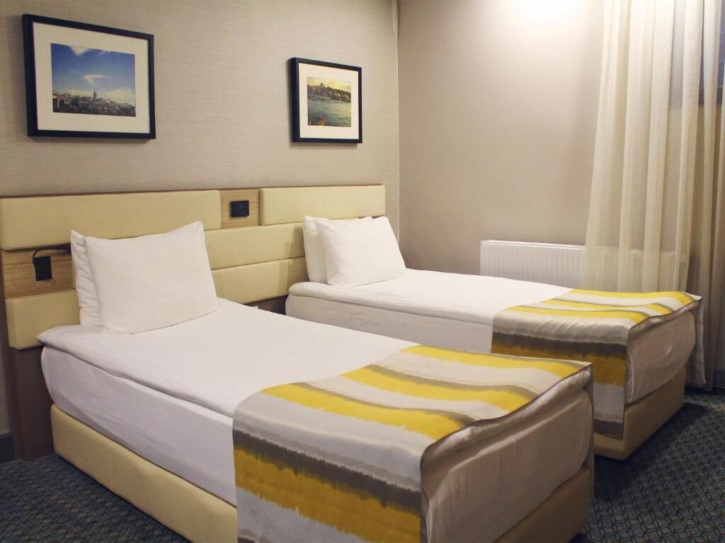 Premium bedding, memory-foam beds, in-room safe, desk