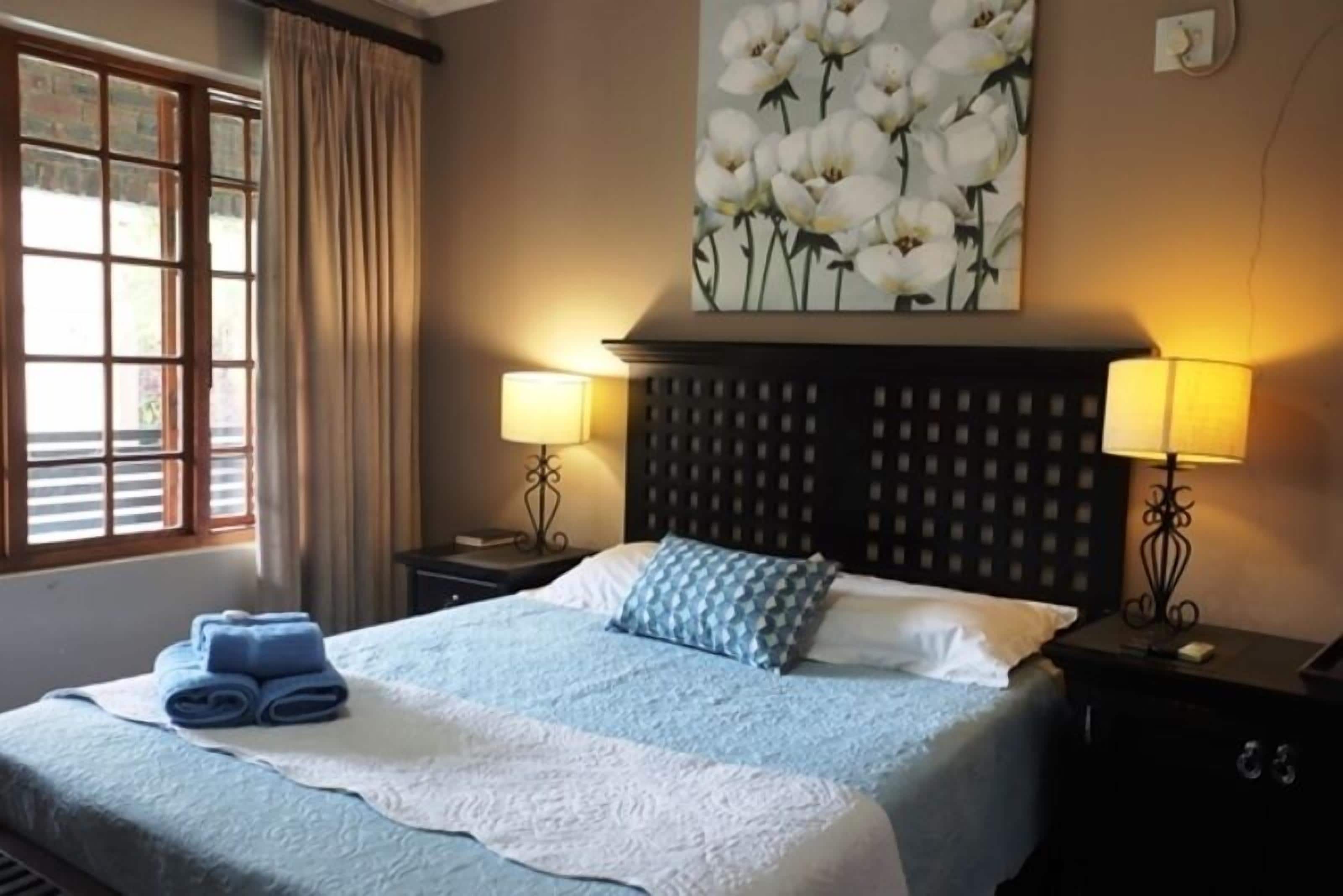 Premium bedding, desk, laptop workspace, free WiFi