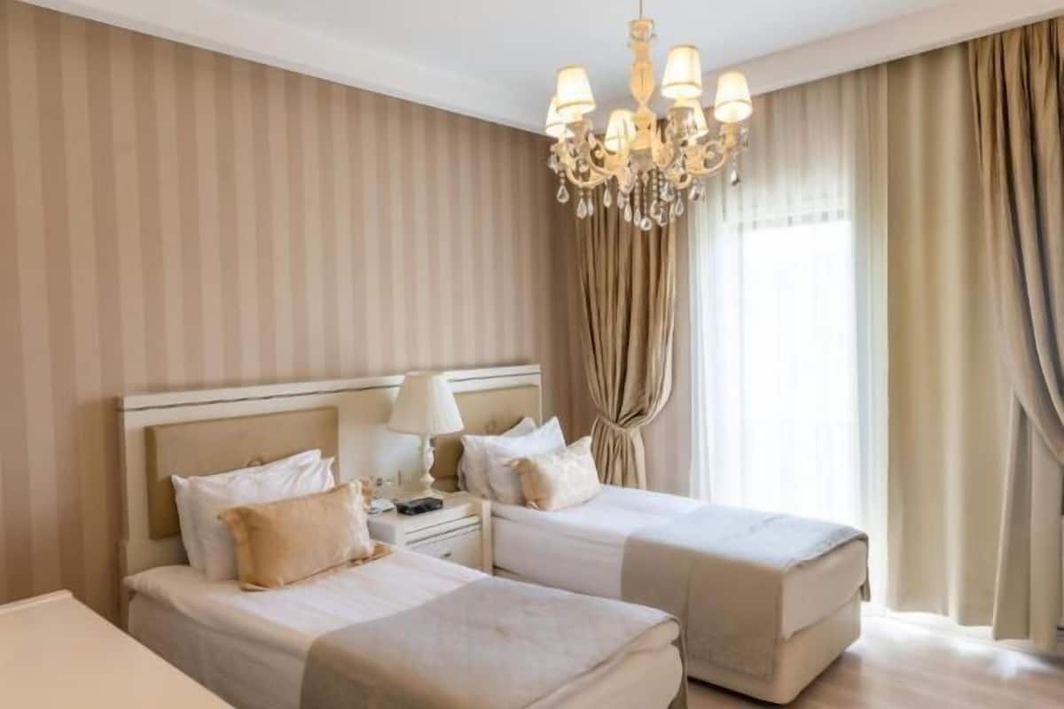 3 chambres, minibar, coffres-forts dans les chambres