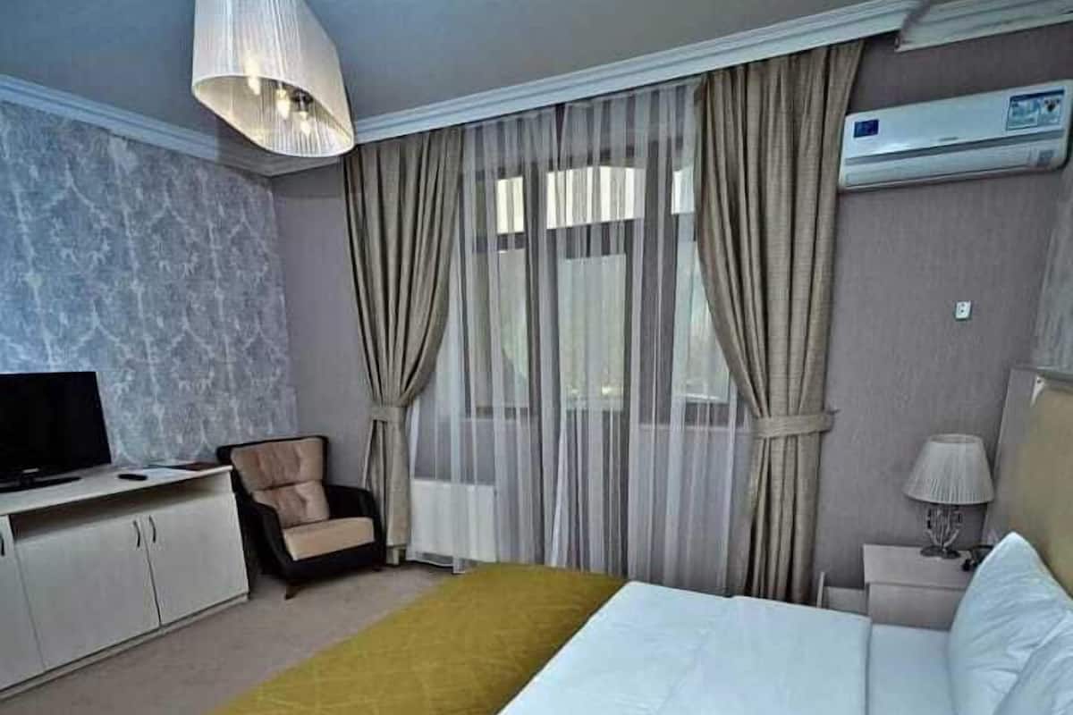 1 habitación y ropa de cama de alta calidad