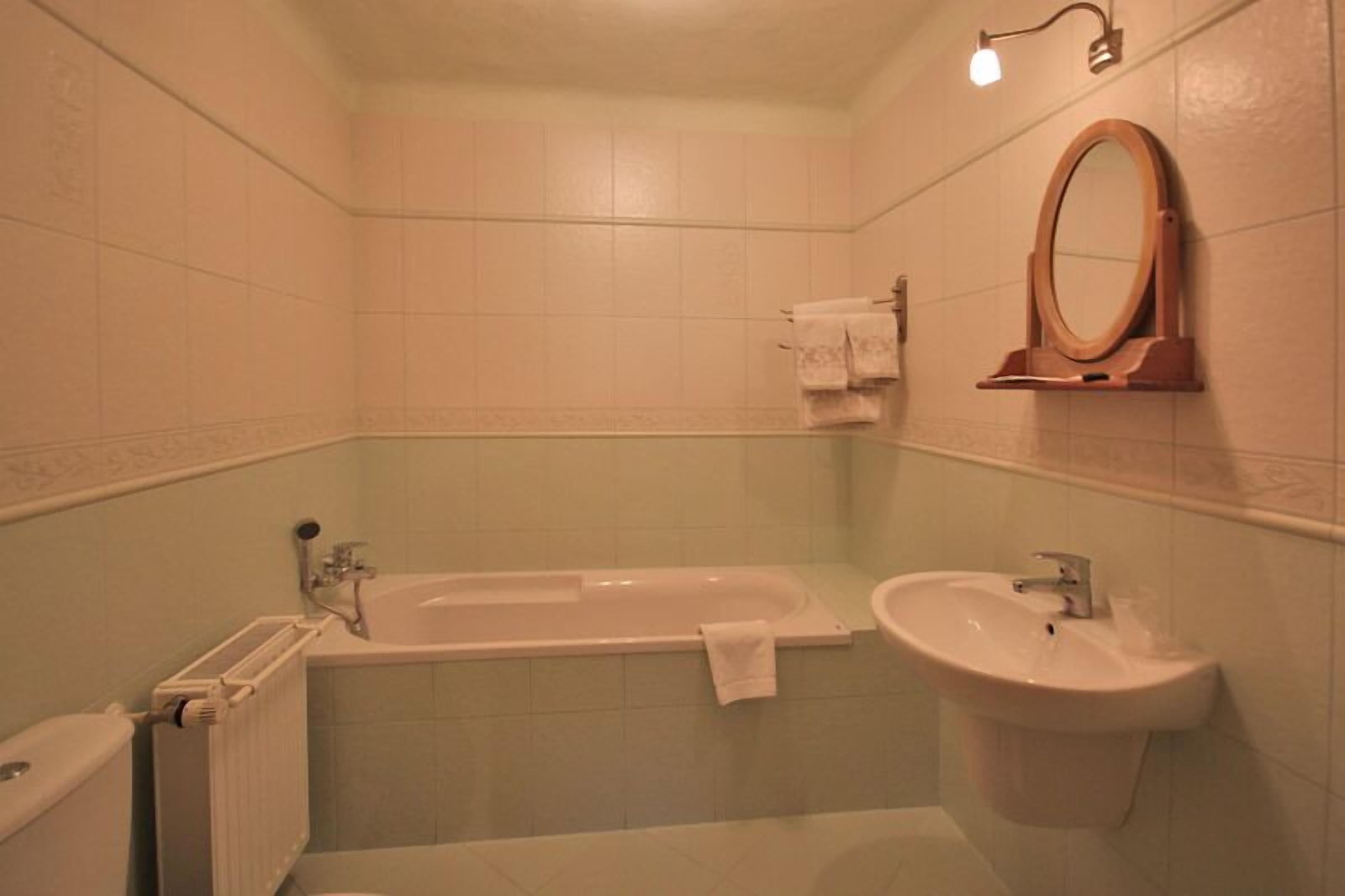 double or twin room, river view | bathroom | hair dryer, towels