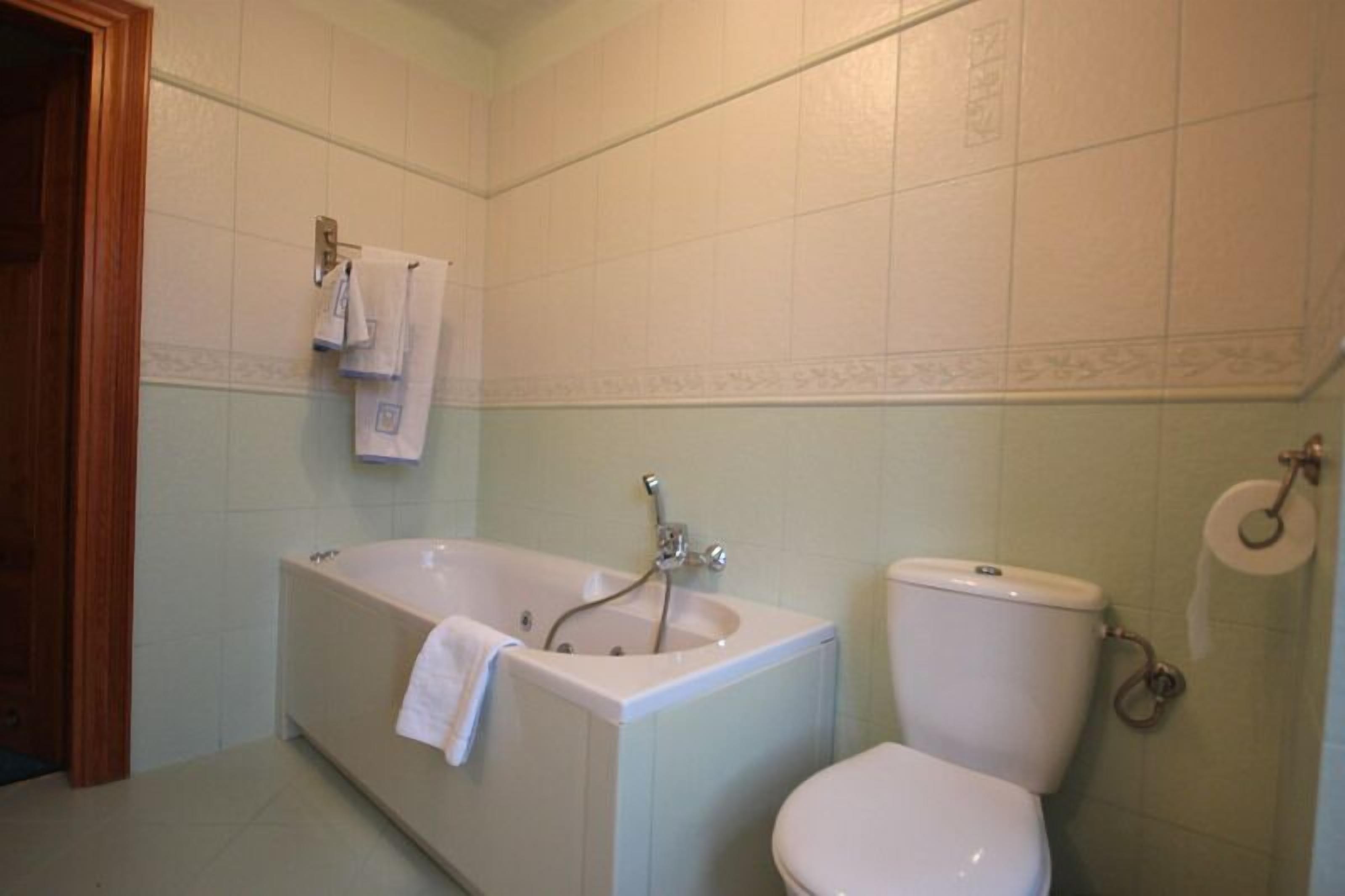 double or twin room, river view | bathroom | hair dryer, towels