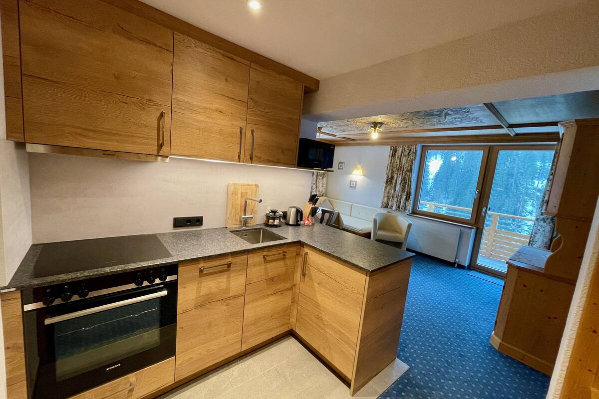 studio, kitchenette, mountain view (self catered) | private kitchen | high chair