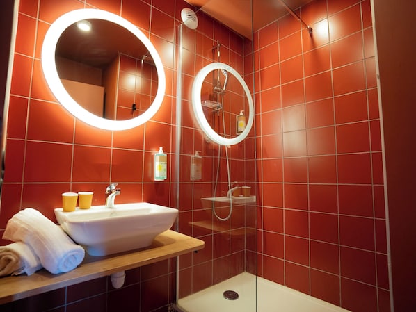 Shower, eco-friendly toiletries, hair dryer, towels