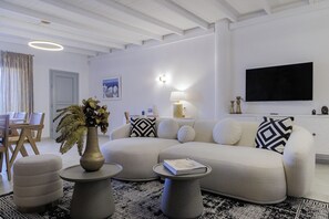 Presidential Villa | Living area | 32-inch LED TV with cable channels, TV - Desiterra Resort & Spa (Santorini)