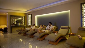 A spa area with reclining chairs, a reception desk, and decorative wall panels. - Premier Vista Hotel Silivri (Silivri)