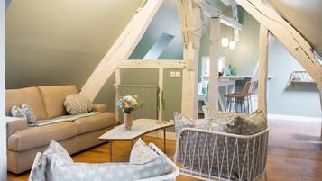 Family Apartment, 3 Bedrooms (Iris) | Living room | Flat-screen TV