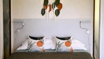 Lakens van Egyptisch katoen, donsdekens, pillowtop-bedden, een minibar