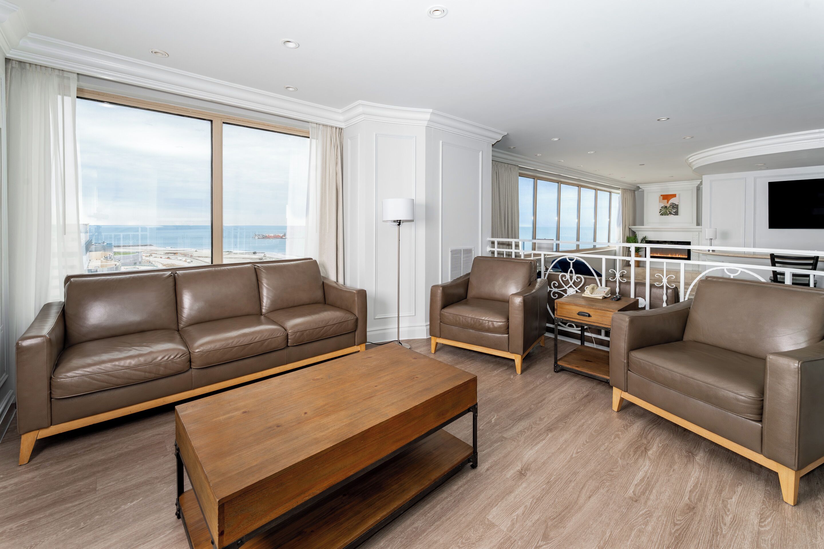 Ocean Front Super Suite with Balcony | Living area | 49-inch flat-screen TV with digital channels, TV