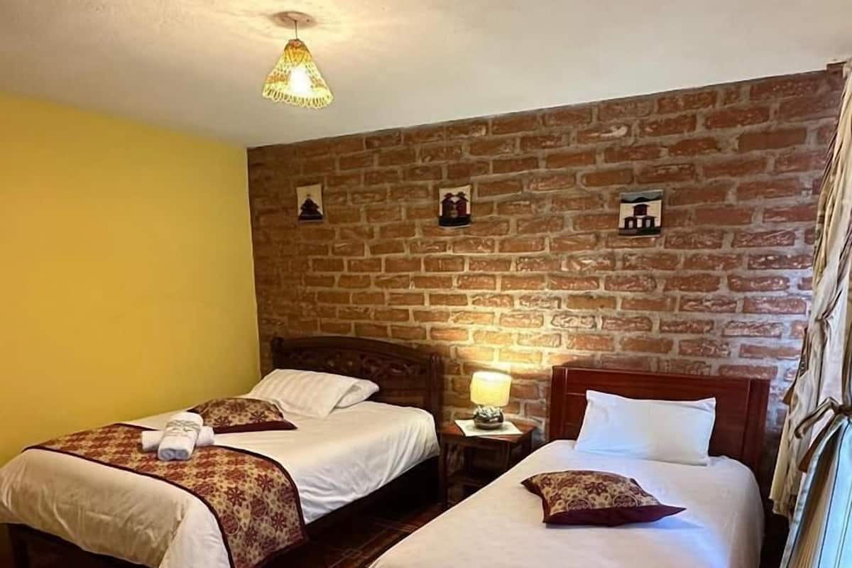 Classic Triple Room, Garden View | Desk, free WiFi