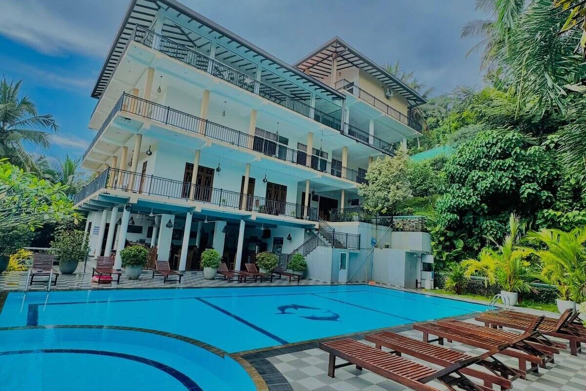 Deluxe Triple Room, Balcony, Pool View | Terrace/patio
