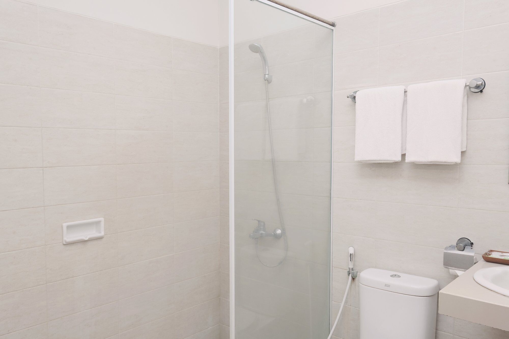 deluxe room | bathroom | shower, free toiletries, hair dryer, dressing gowns