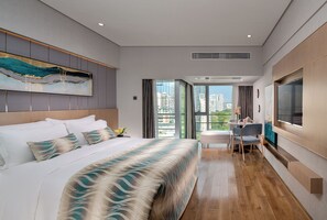 Kamar Double Standar | Seprai premium, selimut bulu angsa, bantalan ekstra lembut, dan minibar