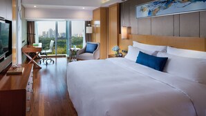 Kamar Double Superior | Seprai premium, selimut bulu angsa, bantalan ekstra lembut, dan minibar