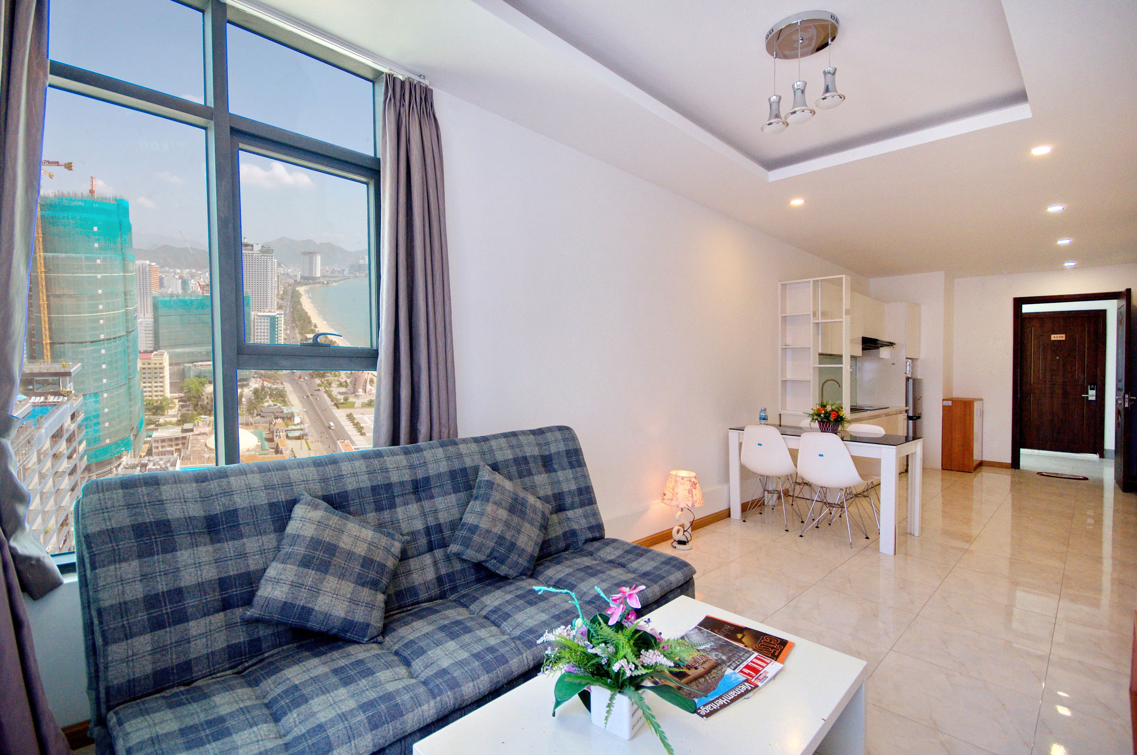 Economy Apartment, 1 Bedroom, City View | Living area | TV, fireplace, DVD player, pay movies
