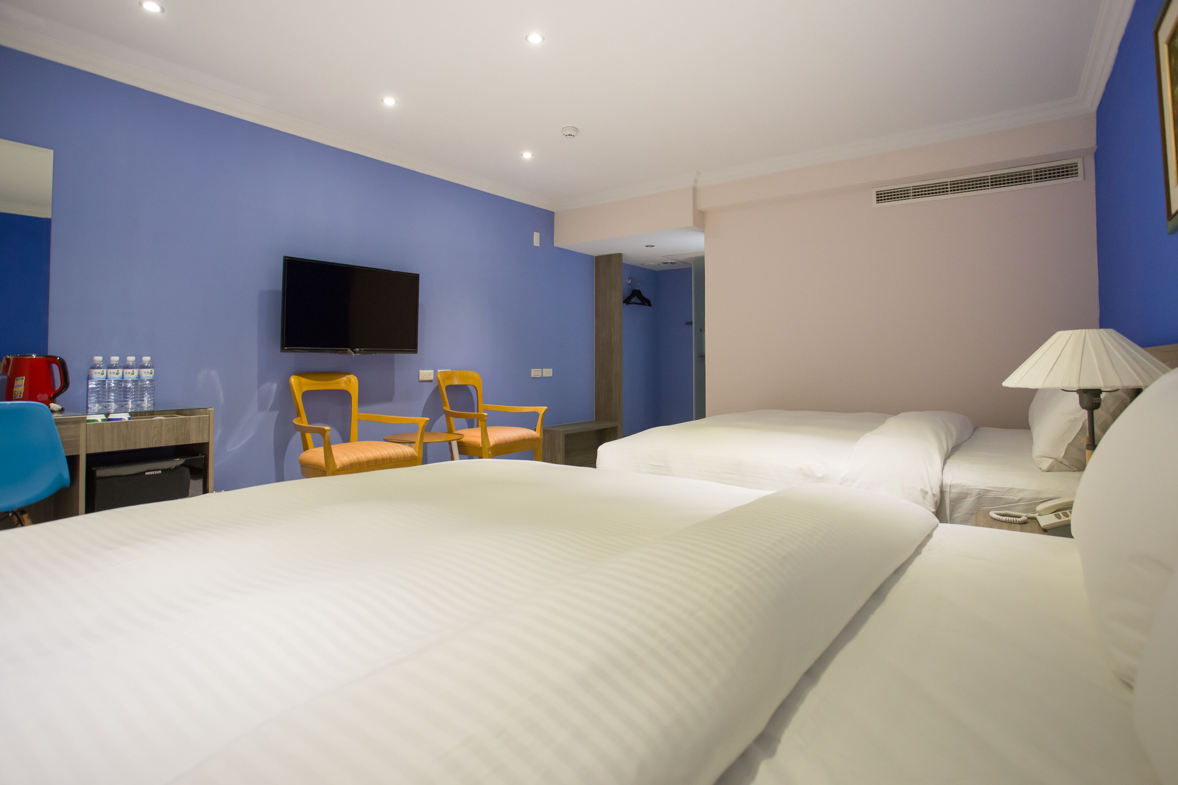 family room | down duvets, desk, soundproofing, iron/ironing board