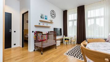 Family Suite | Living area | Flat-screen TV