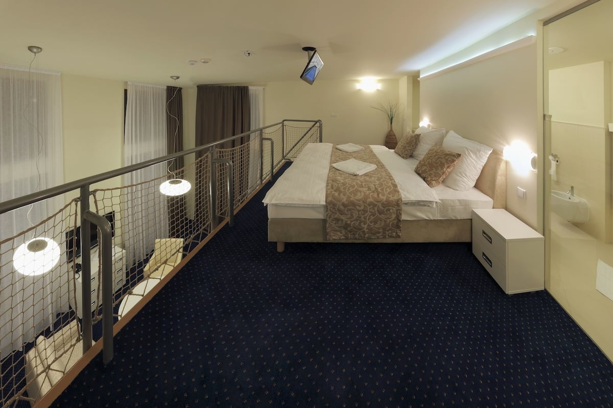 superior duplex, 2 bathrooms | minibar, in-room safe, desk, blackout curtains