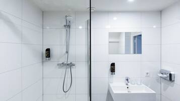 Shower, free toiletries, hair dryer, towels