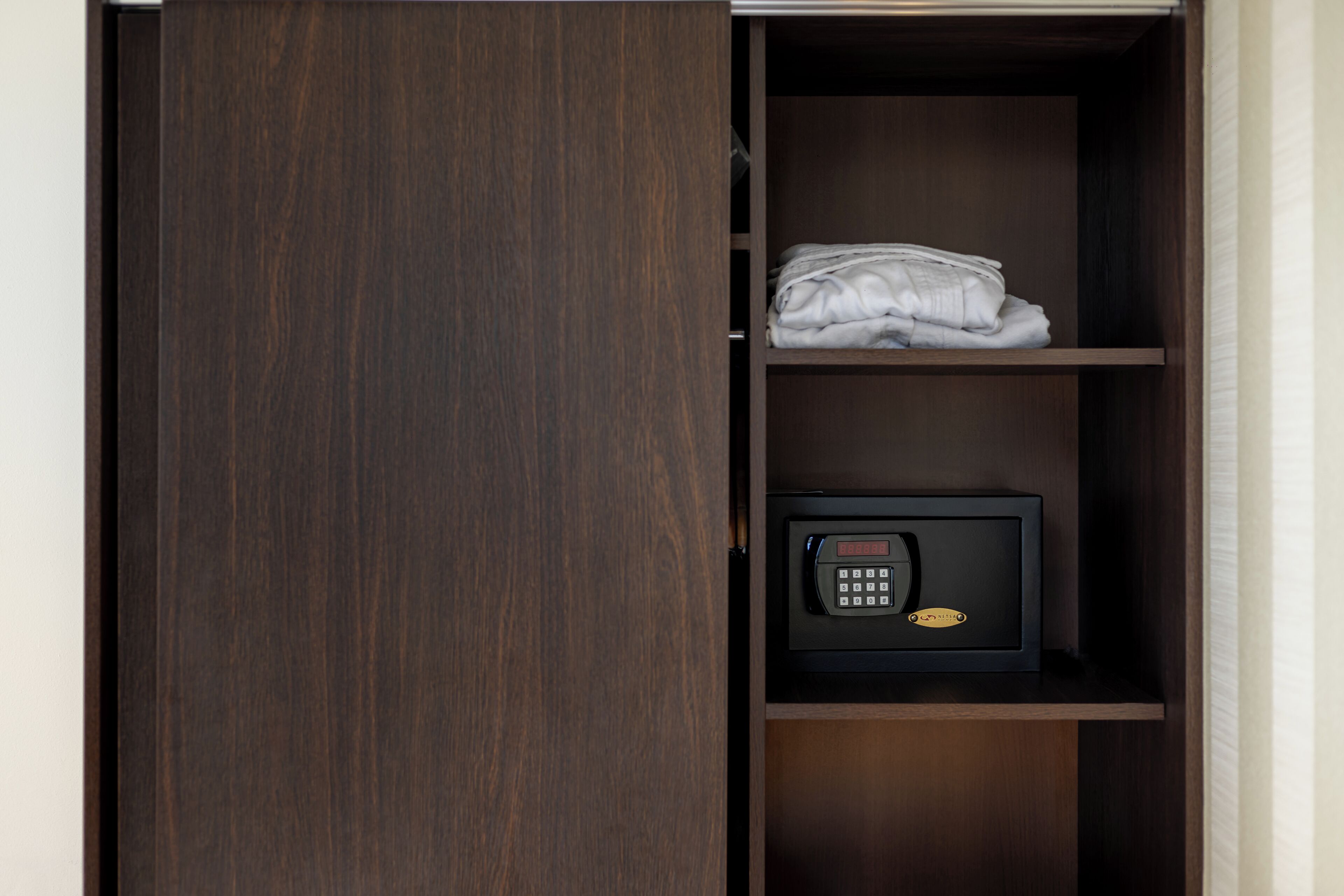 family room, 2 bedrooms | 2 bedrooms, minibar, in-room safe, desk