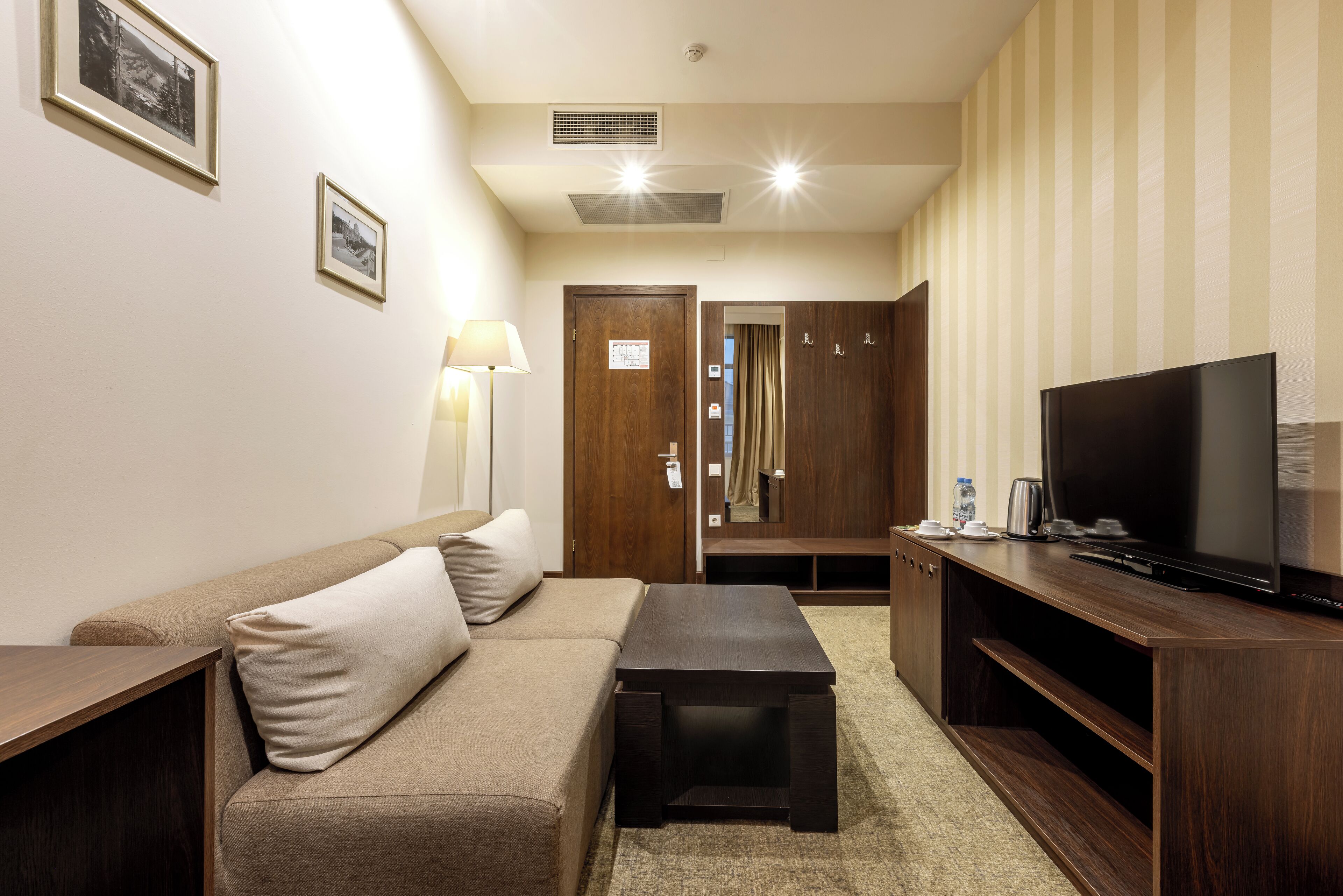 family room, 2 bedrooms | 2 bedrooms, minibar, in-room safe, desk