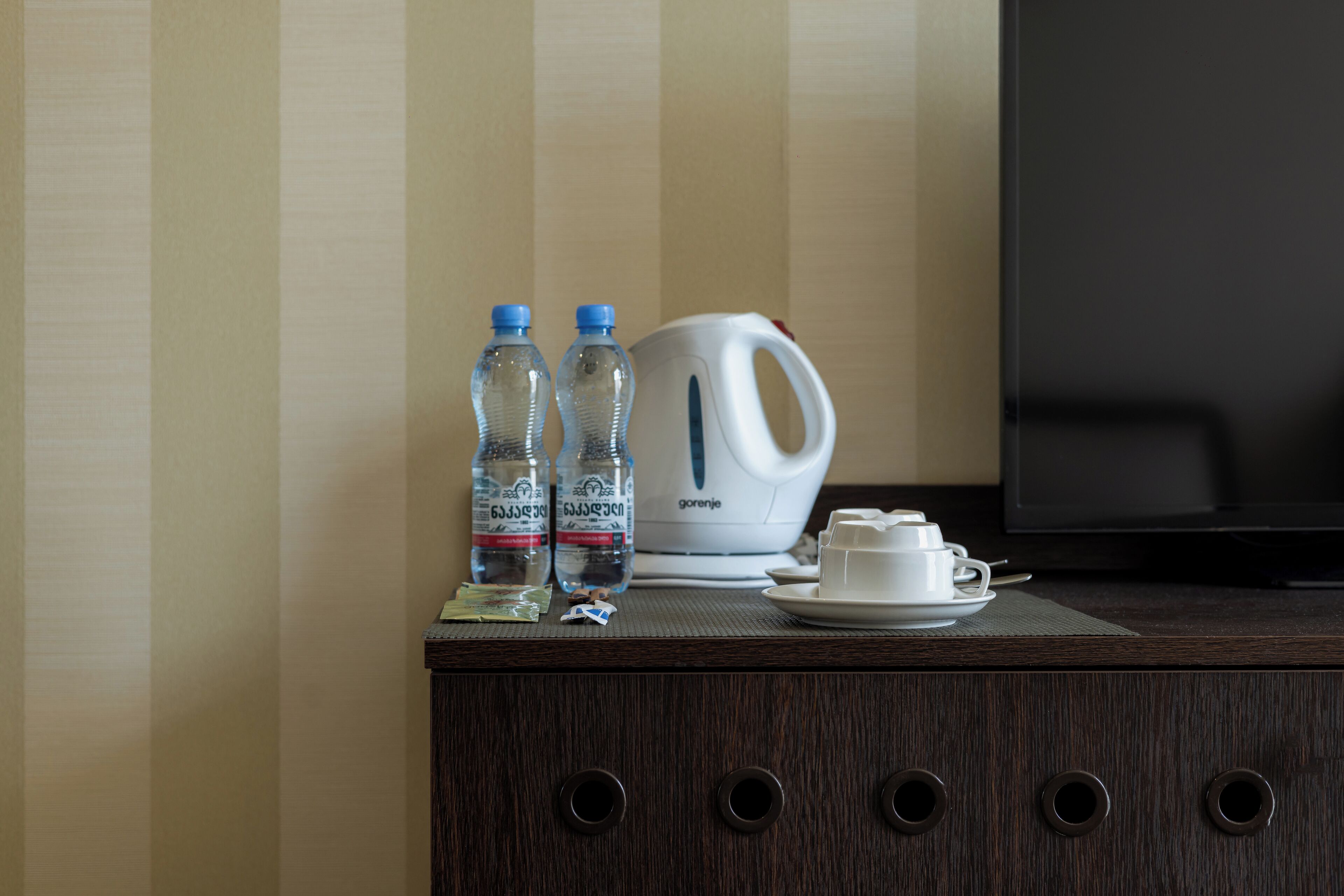 family room, 2 bedrooms | 2 bedrooms, minibar, in-room safe, desk