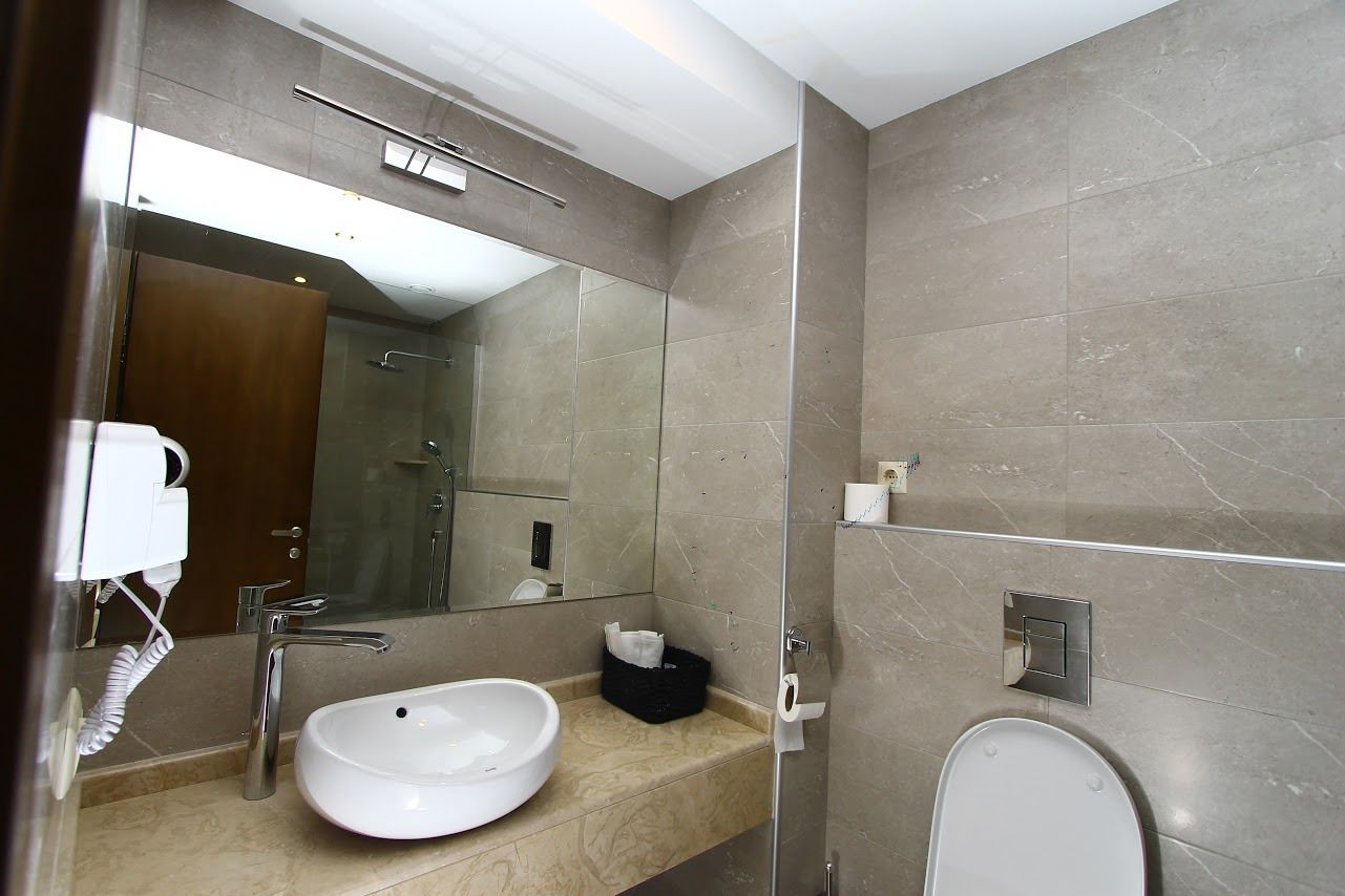 Shower, free toiletries, hair dryer, slippers