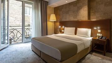 Ropa de cama de alta calidad y minibar