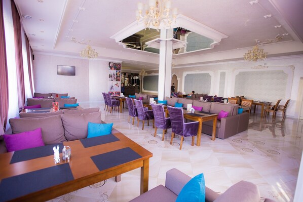 Breakfast, lunch, dinner served; local cuisine 